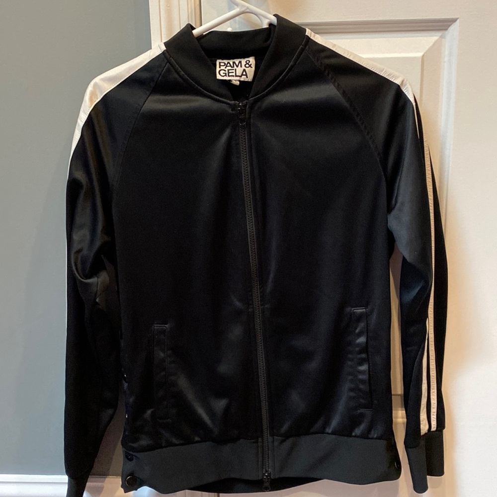 It’s a warm up /santon kind of jacket with a high style twist